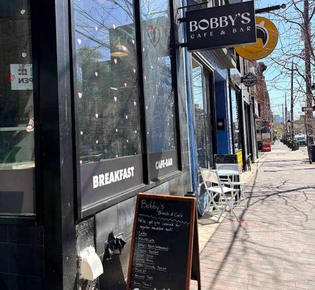 Exterior view of Bobby's Breakfast Cafe & Bar on College Street Toronto